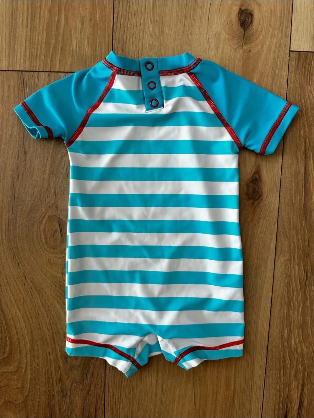 Turquoise Stripe Kids Swim Romper with Wave Graphic